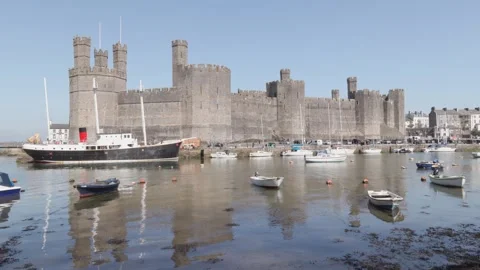 8th April 2026. Caernarfon Castle, a UNESCO World Heritage Site in North Wales Stock Footage 334064752
