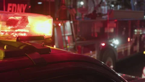 9-20-26, Brooklyn, NY, USA - dusk flashing lights of firetrucks Stock Footage 346107137