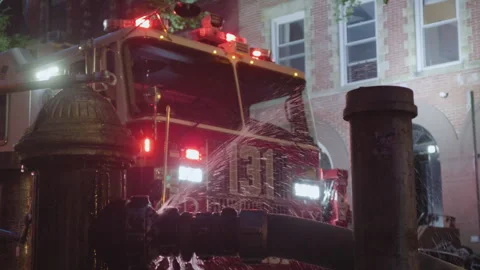 9-20-26, Brooklyn, NY, USA - alt dusk fire hydrant in front of firetruck Stock Footage 346107245