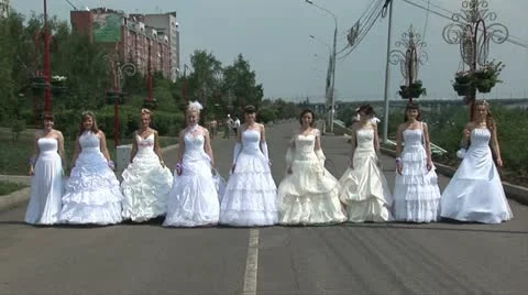 9 brides are walking forward Stock Footage 11226315