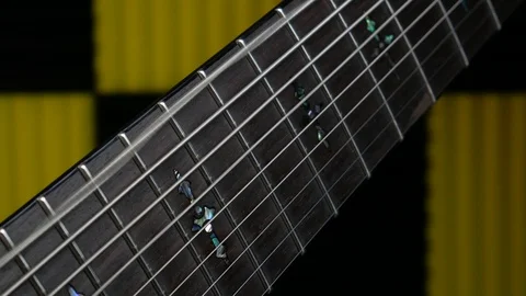 9 String Guitar 8th and 9th String Vibrating Close Up On Fretboard Video stock 96791546