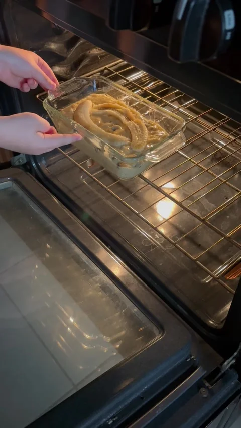 9 years old boy preparing  a banana cake. kids cooking step by step Stock Footage 274656475