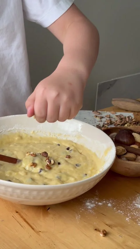 9 years old boy preparing  a banana cake. kids cooking step by step Stock Footage 274656490