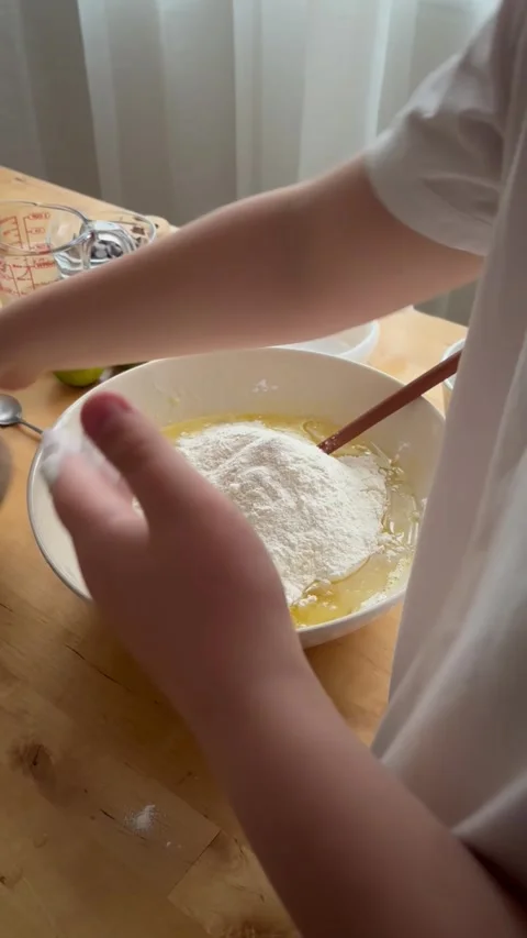 9 years old boy preparing  a banana cake. kids cooking step by step Stock Footage 274656515