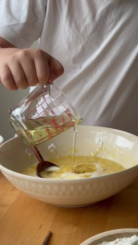9 years old boy preparing  a banana cake. kids cooking step by step Stock Footage 274656577
