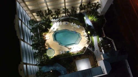 90 Degree Reverse Aerial Rotation Over Luxury Hotel In Tropical Location At Stock Footage 128990168