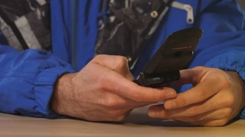 90s Using a Flip Phone Closeup Retro Techonologie Stock Footage 144879861