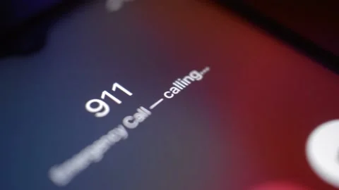 911 emergency numer call on the iphone screen in night. Stock-Footage 234194484