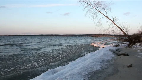9673 1Ice in a freezing river in the fall at sunset, Ob reservoir,  Russia Stock Footage 83299872