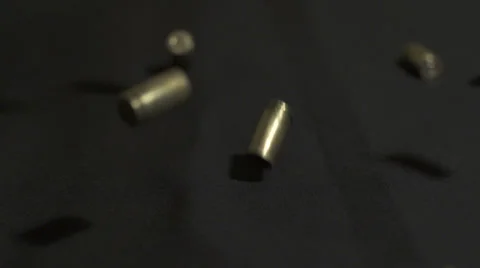 9mm Bullet Shells Falling in Slow Motion High Speed Camera Stock Footage