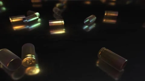9mm Bullet Shells on a reflective surface 库存影片 60768167