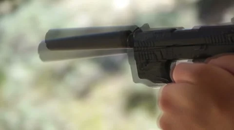 9mm pistol with suppressor Stock Footage 8650257