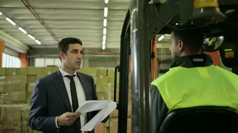 9of19 People working in warehouse, workers in industry Stock Footage 32901588