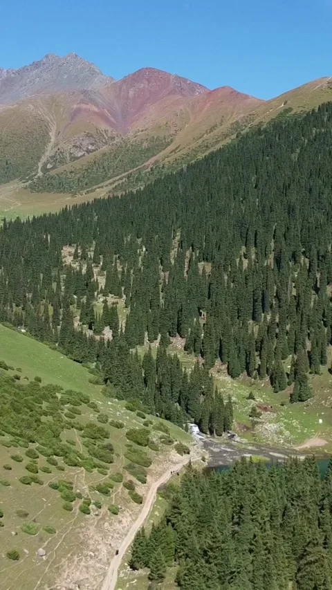 9x16: Drone Pull Away From Lake To Vista. Kyrgyzstan, Suttuu-Bulak Lake. Stock Footage 332779246