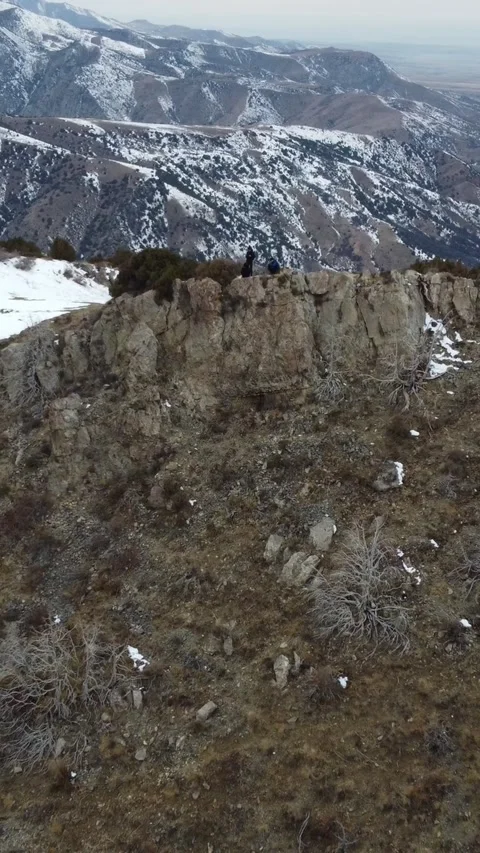 9x16: Drone Pull Away From People On Peak. Kazakhstan, Sayram-Ugam Park Stock Footage 332779080