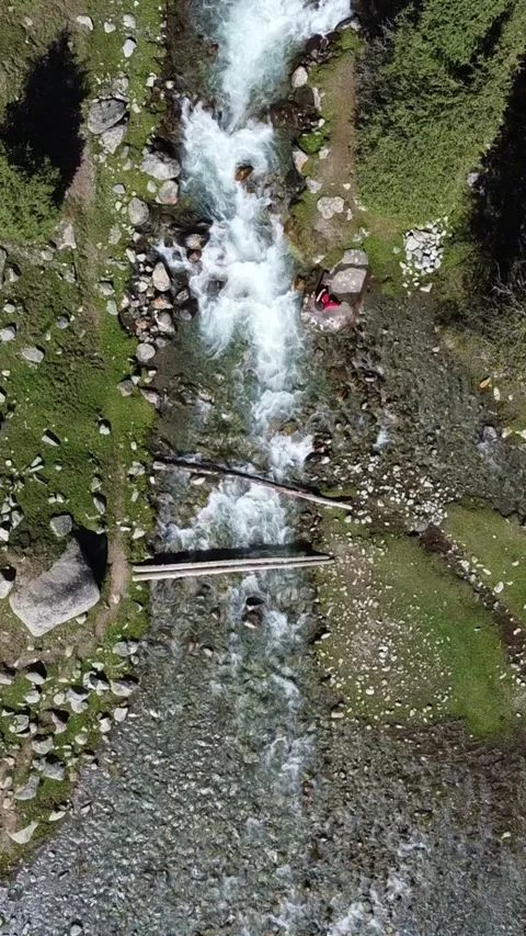 9x16: Top Down Drone Pull From River Camp. Stock-Footage 332779265