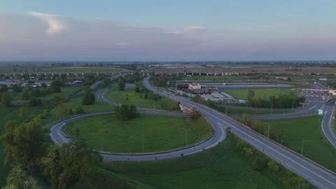 A1 and A21 motorway junction with SS9 Via Emilia near Fiorenzuola d’Arda Italy Stock Footage 336257941