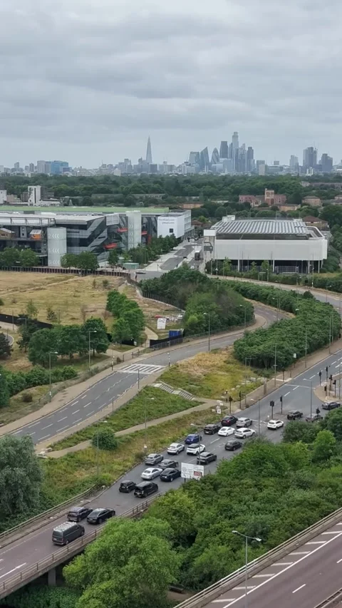 A12 hyperlapse toward City of London skyline with traffic and Thames-side Stock Footage 337406090