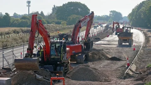 A259 road widening, construction &amp; resurfacing in West Sussex, UK Stock Footage 203245920