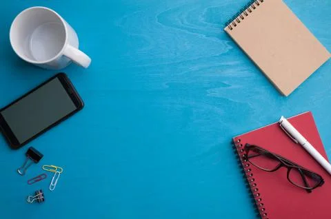 A4 clipboad on blue wood table Stock Photos