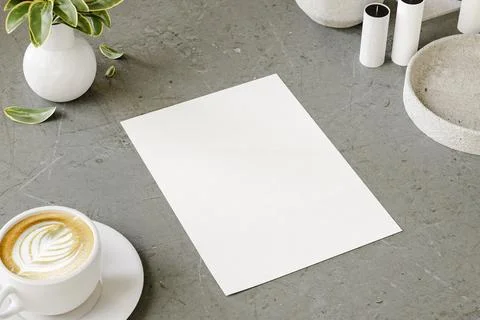 A4 sheet mock up for presentation and advertising on minimal table. 3D rend.. Illustrazione stock