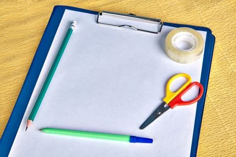 A4 size clipboard file folder with writing implement. Stock Photos
