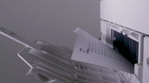 A4 text printed paper coming out the rear of a laser printer Stock Footage 140694929