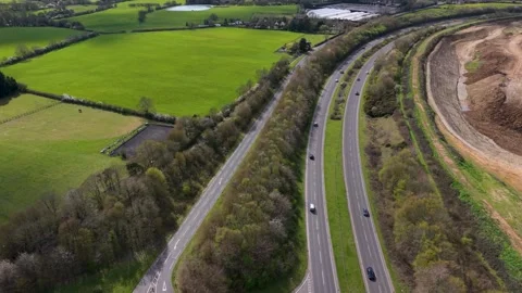 A414 road drone flyover approaching T-junction by Panshanger quarry Stockbeeldmateriaal 333286343