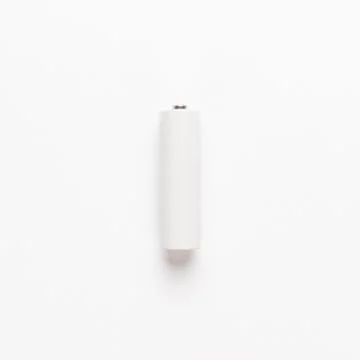AA battery over white background not isolated Stock Photos