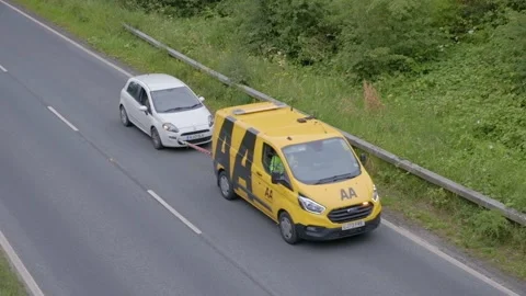 AA breakdown recovery van on a countryside road. York.UK. 6.7.2024 動画素材 279249946