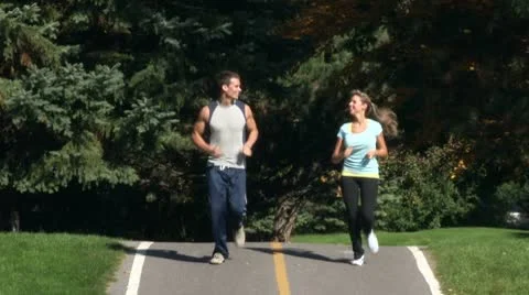 AA076401 jogging fitness young happy people park run 1 Stock Footage
