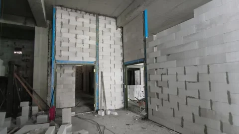 AAC Block Wall Construction with Metal Stiffener and Lintel Stock Footage 342479678