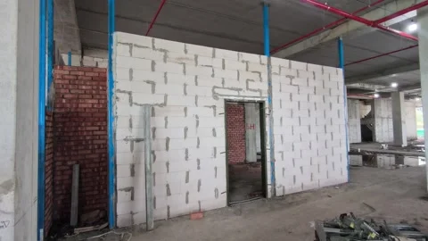 AAC Block Wall Construction with Metal Stiffener and Lintel Stock Footage 342479699