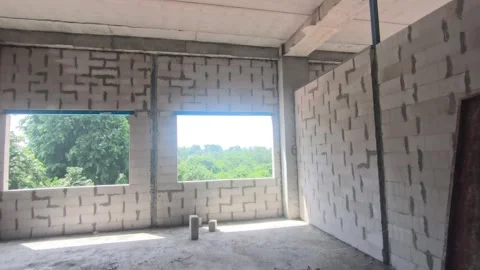 AAC Block Wall Construction with Metal Stiffener and Lintel Stock Footage 342479767