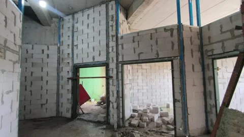 AAC Block Wall Construction with Metal Stiffener and Lintel Stock Footage 342479879