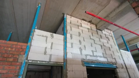 AAC Block Wall Construction with Metal Stiffener and Lintel Stock Footage 342479891