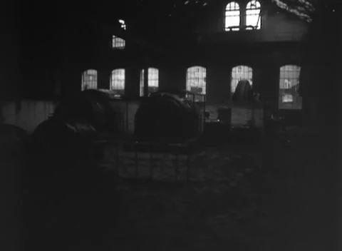 AACHEN, GERMANY - 1944: Arched window wall - stands stripped of glazing Stock Footage 344599626