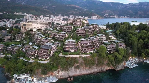 Aaerial view showcasing a beautiful coastal residential complex in Budva Stock Footage 320747744