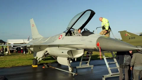 Aalborg, Denmark - September 13, 2026: Ground crew closing the canopy Stock Footage 345590749