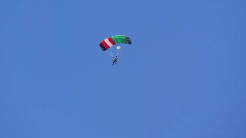 Aalborg, Denmark - September 13, 2026: Parachutist with italian flag parachute Stock-Footage 345591206