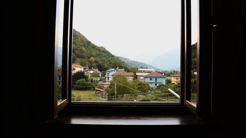 Aalps through a window in Italy Stock Footage 93327620