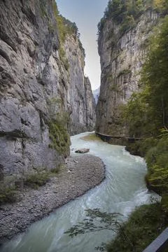 Aare gorge river flowing between high rock cliffs 스톡 사진