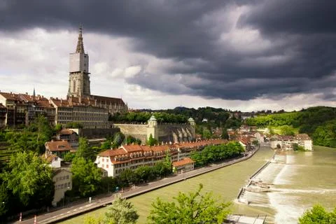 The Aare River in Bern characterized by its steep riverbank incline exemplifying Stock Photos