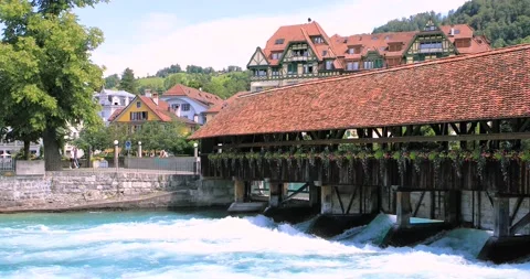 Aare river in Thun with old historical wooden bridge. Stock Footage 135163932