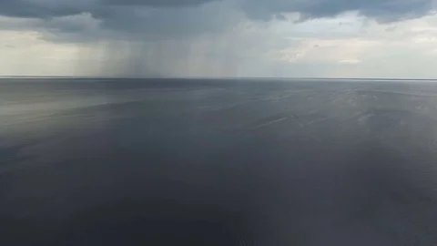 Aarial View of Rain Above Pond. Stock Footage 76947765