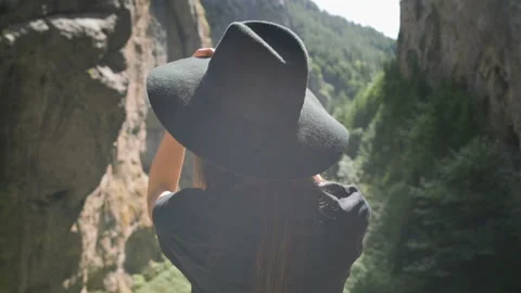 Aback view of stylish women making selfie in nature Stock Footage 140719624