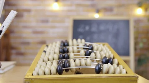 Abacus on the background of an empty school class with chalkboard, close up Stock Footage 161009950