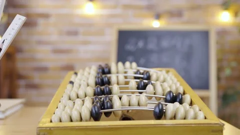 Abacus on the background of an empty school class with chalkboard, close up Stock Footage 161009990