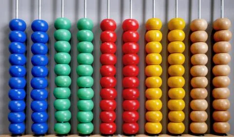 Abacus for Counting Practice on Gray Background Stock Photos