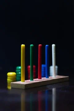 An abacus on a dark table, mathematical tools Stock Photos